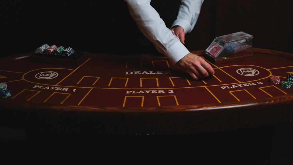 a person in a suit playing in the casino