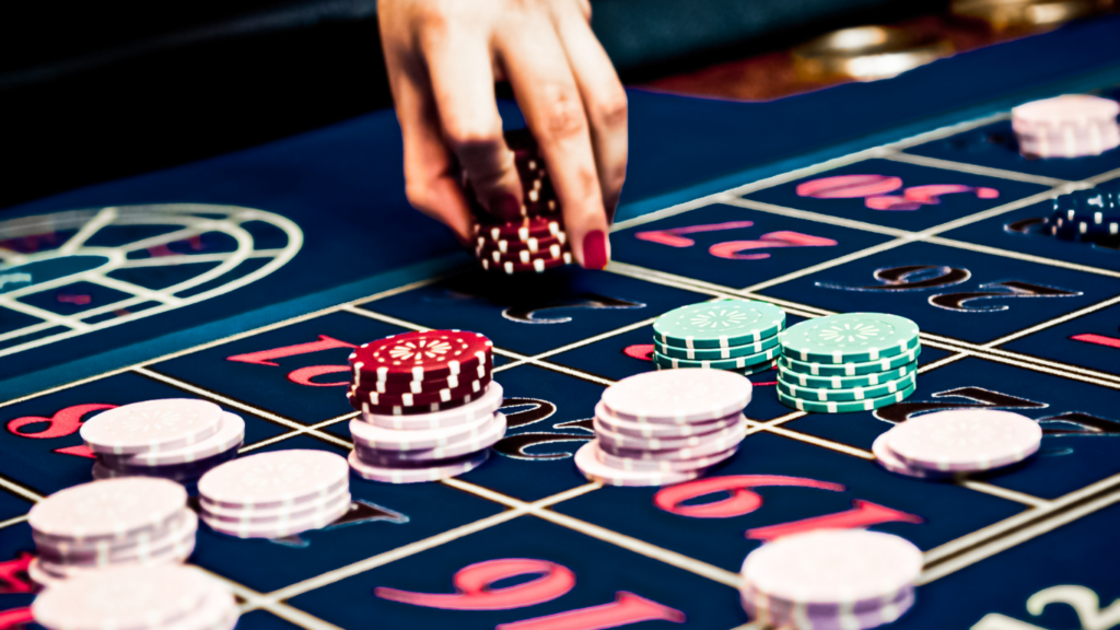 A lady betting and playing roulette in casino