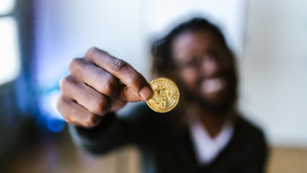 a person holding a crypto