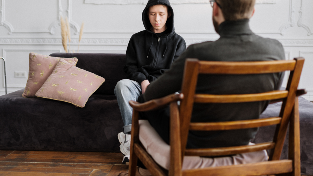 a person sitting on the couch